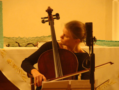 Czech cellist Anna Brikciusov, poetry reading Brikciusov Na Prdle & Opil plachtivice (Festival Poetry Day 2014 - 204th anniversary of the birth of Karel Hynek Mcha - Year of Czech Music 2014), Kostel sv. Jana Křtitele Na Prdle, Prague 2014. Photo archive http://Festival.Brikcius.com